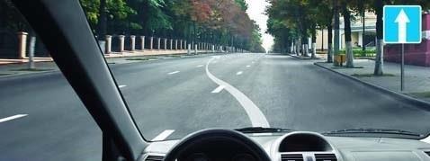 In this situation, which signal indicator light should the driver turn on when making a stop?