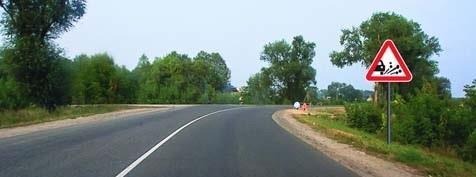 What does the road sign warn about?