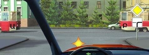 When passing through the intersection, the driver is required to yield the right of way to
