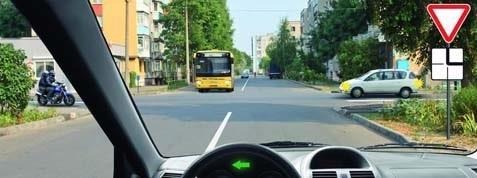 In this situation, when making a left turn, you are required to yield the right of way to