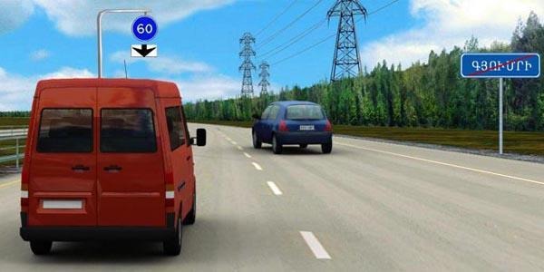 At what speed can a bus driver continue driving in the lane marked by this sign?