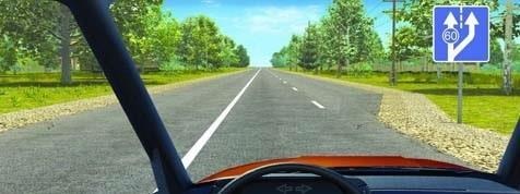 When towing a motor vehicle, which lane of this road can you continue driving?